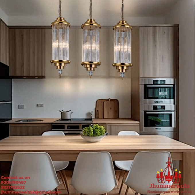 Brass pendant ceiling light illuminating a modern kitchen island, showcasing elegant glass pendant lights for a stylish living space