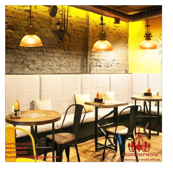 Brass pendant ceiling light illuminating a modern kitchen island, showcasing elegant glass pendant lights for a stylish living space