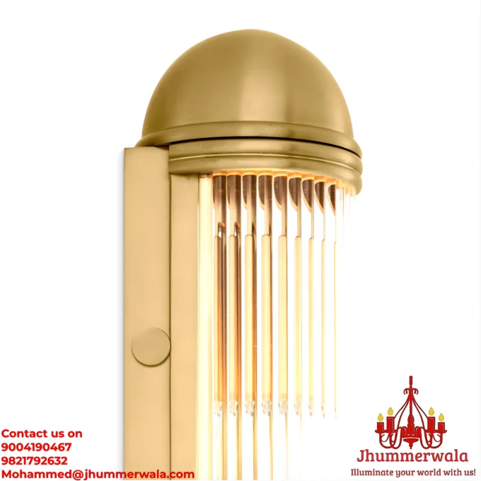 A photorealistic image of a contemporary wall light with a Matte polished brass fitting and a clear glass Rods