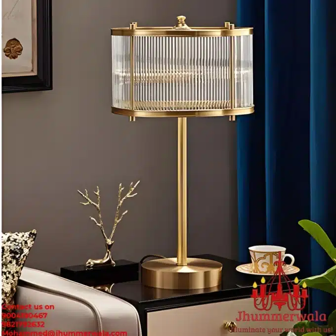 Experience sophistication with the Aurelian Glow table lamp, featuring an intricate design of brass rods converging into a captivating glass rod circle at the end.