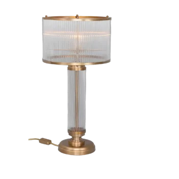 Experience opulence with the Grandeur Rods of Radiance, a luxury table lamp featuring a brass base and intricate glass rods creating a captivating design.