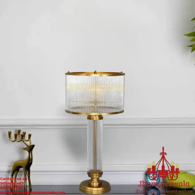 Experience opulence with the Grandeur Rods of Radiance, a luxury table lamp featuring a brass base and intricate glass rods creating a captivating design.