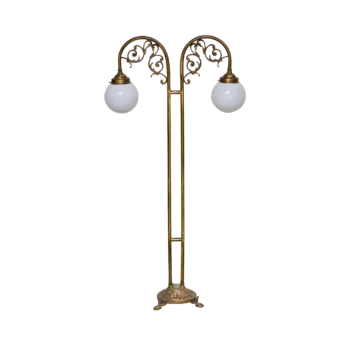 Luminous Twin Antique Brass Floor Lamp with two milky globes, showcasing a vintage-inspired design in an antique brass finish, ideal for adding a touch of timeless elegance to contemporary living rooms.